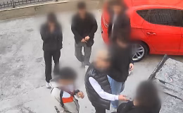 Kolyesini gasp etmişti, silah teşhirinden tutuklandı