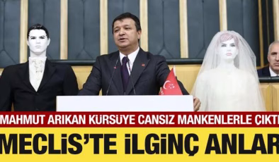 Meclis’te ilginç anlar: Mahmut Arıkan kürsüye gelin ve damat mankeniyle çıktı