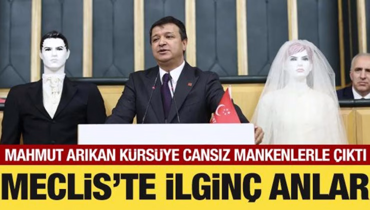 Meclis’te ilginç anlar: Mahmut Arıkan kürsüye gelin ve damat mankeniyle çıktı
